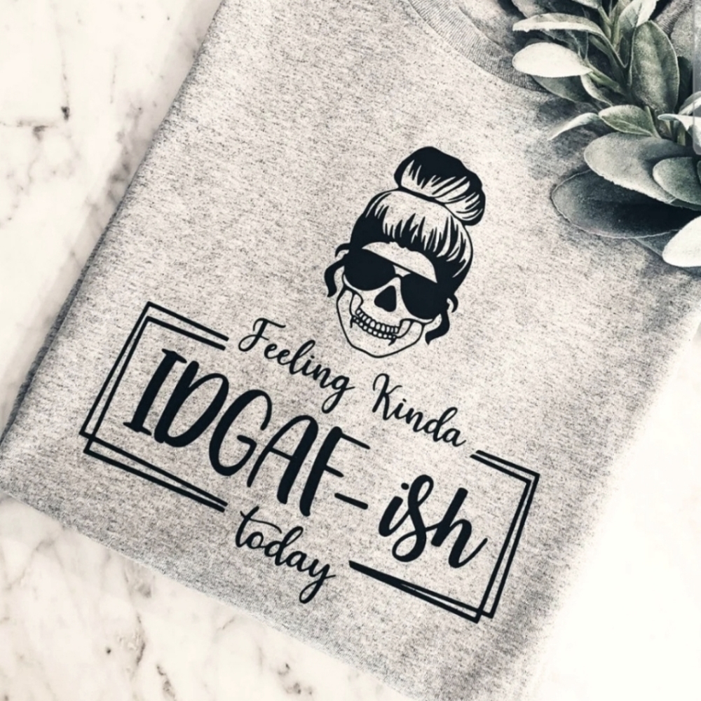 Skull shirt idgaf messy bun cute popular trending
